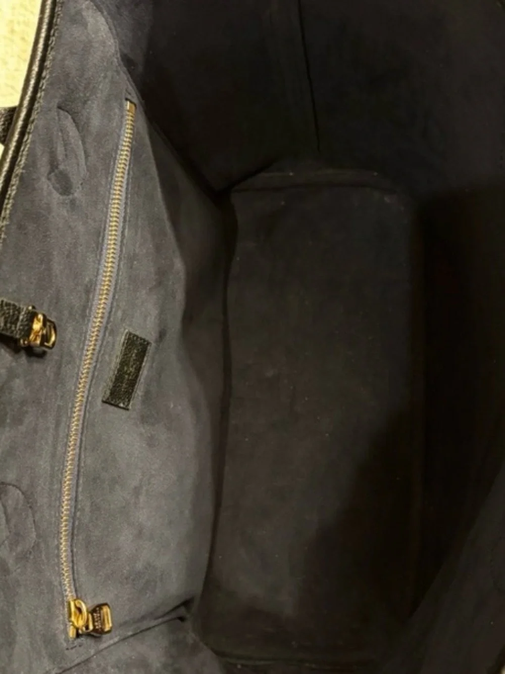 Louis Vuitton Black Embossed Monogram never fall MM with Pouch